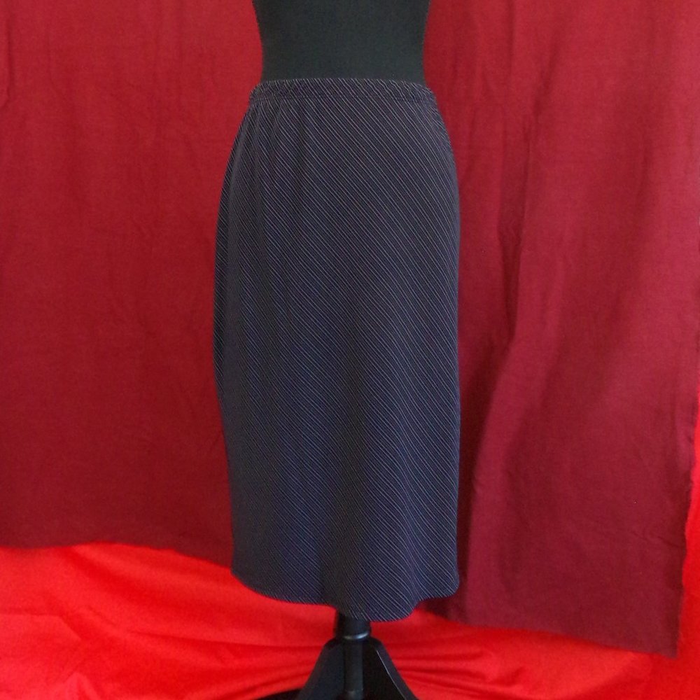 Black pin stripe skirt.